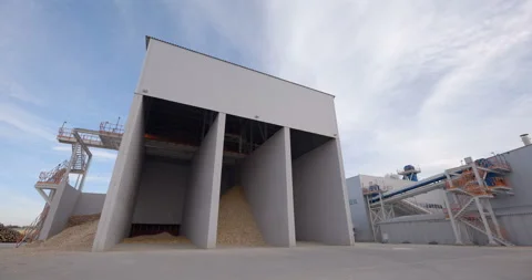 Production building of a timber processing plant, where wood chips  Stock Footage 161969056