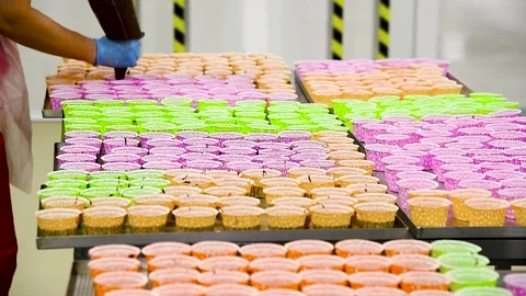 Production of buns, pies, bread, cookies in a bakery. Production of bakery .. Stock Footage 252520105