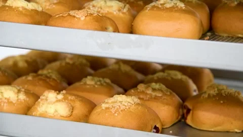 Production of buns, pies, bread, cookies in a bakery. Production of bakery .. 動画素材 252520149