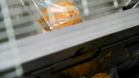 Production of buns, pies, bread, cookies in a bakery. Production of bakery .. Stock Footage 252520177