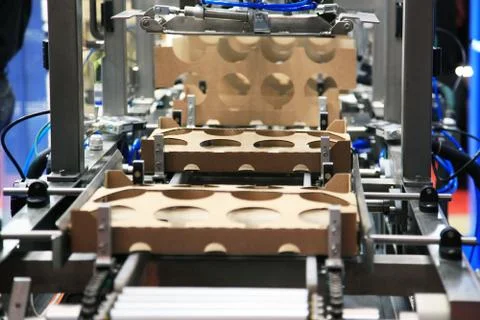 Production of cardboard packaging Stock Photos
