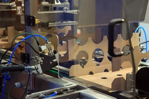 Production of cardboard packaging Stock Photos