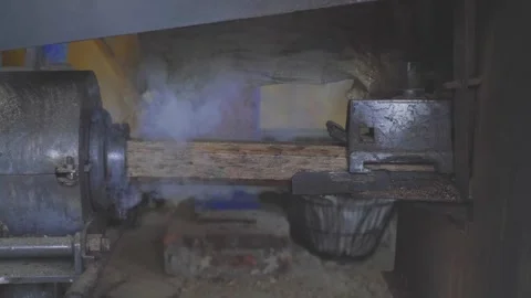 The production of compressed sawdust fuel. The process of creating fuel briquett Stock Footage 250521523
