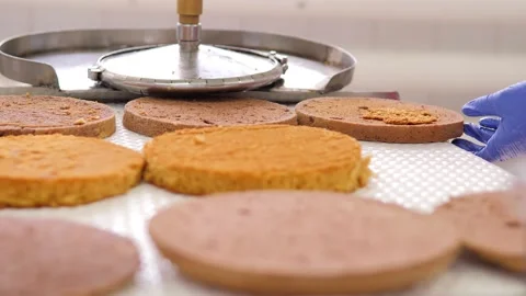 Production of confectionery products. The process of baking and impregnation of Stock Footage 171893950