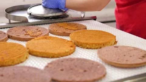 Production of confectionery products. The process of baking and impregnation of Stock Footage 171893995