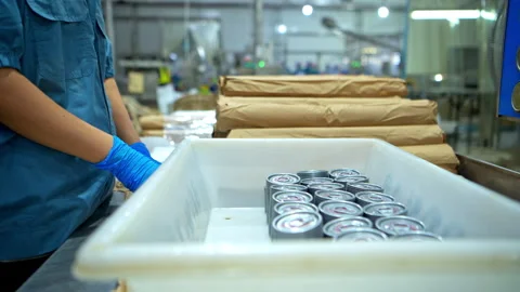 Production control supervisor inspects the can in the production line Stock Footage 339005885