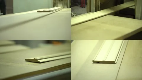 Production conveyor. Baseboard manufacturing. Split Screen Stock Footage 256077958