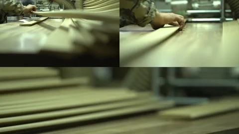Production conveyor. Baseboard manufacturing. Split Screen Stock Footage 256077961