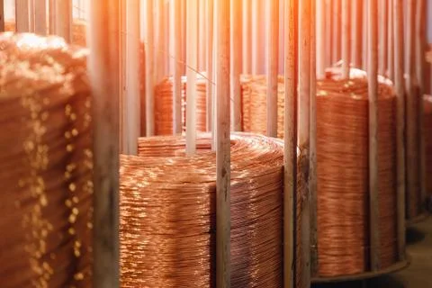 Production of copper wire, bronze cable in reels at factory 스톡 사진