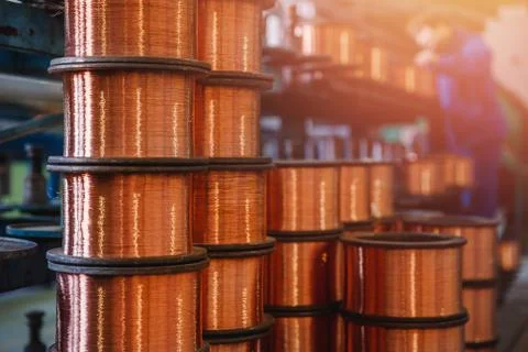 Production of copper wire, bronze cable in reels at factory Stock-Fotos