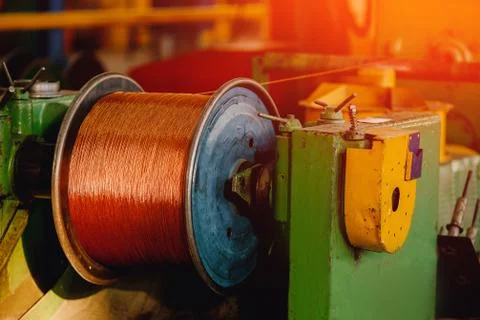 Production of copper wire, bronze cable in reels at factory Stock Photos