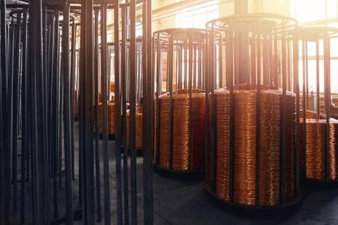 Production of copper wire, bronze cable in reels at factory Stock Photos