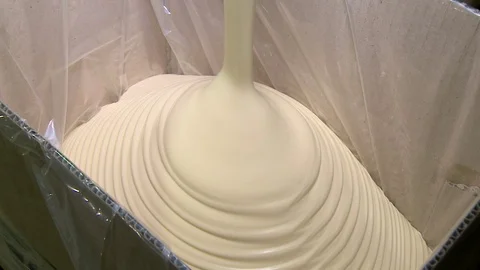 Production cube of margarine in dairy factory. Bottling and packaging of Stock Footage
