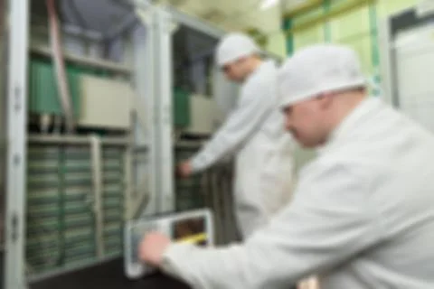 Production of electronic components  at high-tech factory blur b Stock-Fotos