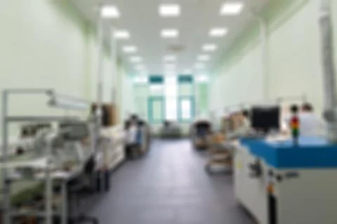 Production of electronic components  at high-tech factory blur b Stock-Fotos