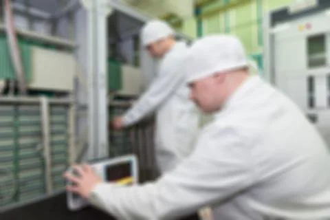 Production of electronic components  at high-tech factory blur b Stock Photos