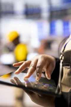 Production engineer working on a tablet 스톡 사진