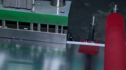 Production files. the machine makes the side holes for fasteners Stock Footage 64767482