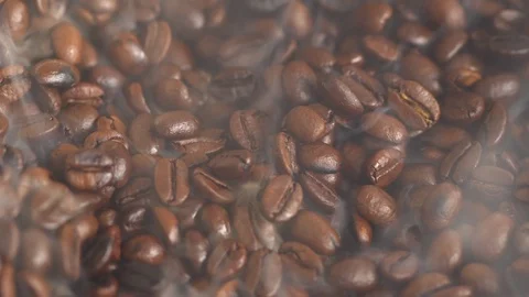Production of fresh fried coffee beans roasting factory process. Prepared coffee Stock Footage 125290711