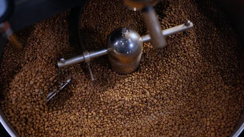 Production of fresh fried coffee beans roasting factory process. Prepared coffee Video stock 129311729
