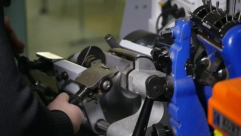 Production of keys. Making a copy of the... | Stock Video | Pond5