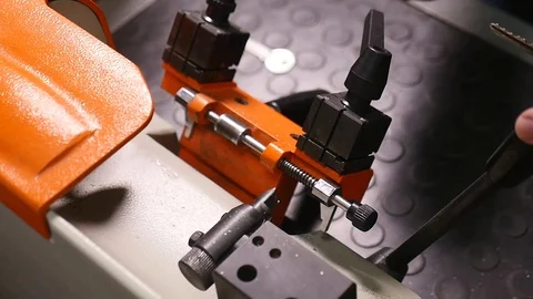 Production of keys. Making a copy of the... | Stock Video | Pond5