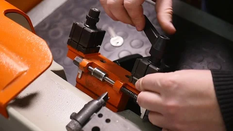 Production of keys. Making a copy of the... | Stock Video | Pond5