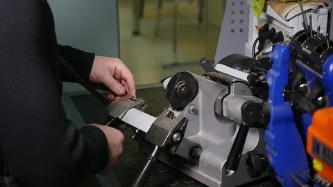 Production of keys. Making a copy of the... | Stock Video | Pond5