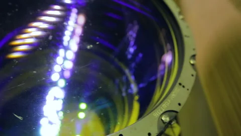 The production lens close up. A small window inside the production machine in Stock Footage 92494479