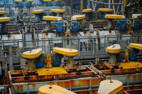 Production line with baths of floatation machine at factory Stock Photos