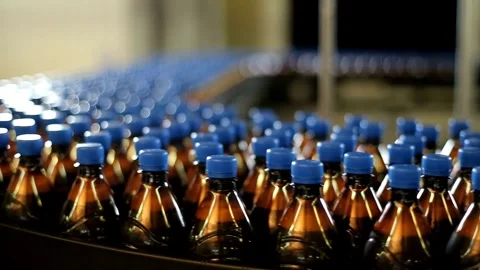 Production Line of Carbonated Drinks Close up of plastic bottle industry on a Stock-Footage 334588980