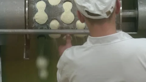 Production line machinery processing freshly fermented cheese Stock Footage 168506812