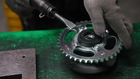 Production Line Operator Uses Electric Torque Wrench for Engine Assembly Stock Footage 342580007