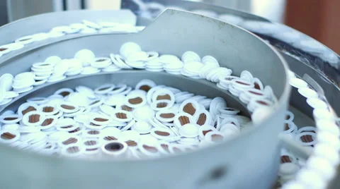 Production line with the packaged capsules at the coffee factory Stock-Footage 52314172