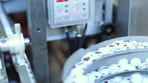 Production line with the packaged capsules at the coffee factory Stock Footage 52314181