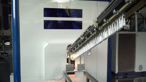 Production line of plastic bottles. Plastic blanks on an automatic conveyor line Video stock 111663081
