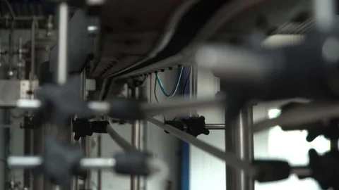 Production line of plastic bottles. Plastic bottles on automatic conveyor line Stock Footage 111663245