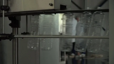 Production line of plastic bottles. Plastic bottles on automatic conveyor line Stock Footage 111663314