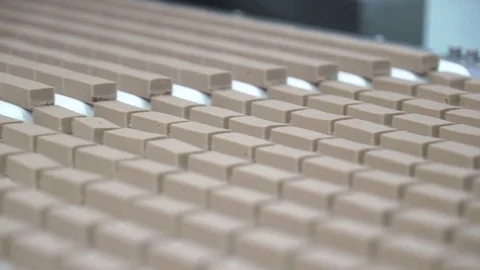 Production line for the production of chocolates. Candy covered with chocolate Video stock 74183125