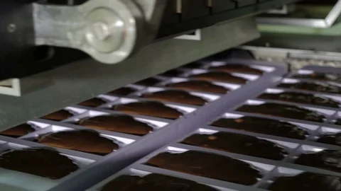 Production line for the production of chocolates. Candy covered with chocolate Video stock 74183244