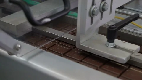 Production line for the production of chocolates. Candy covered with chocolate Video stock 74183475