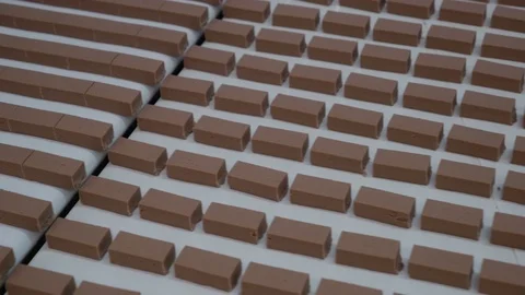 Production line for the production of chocolates. Candy covered with chocolate Stock Footage 74197752