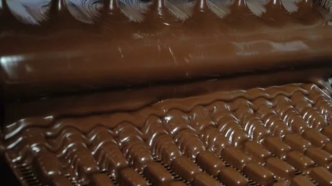 Production line for the production of chocolates. Candy covered with chocolate Video stock 74205484