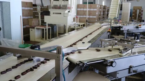 Production line for the production of chocolates. Candy covered with chocolate Video stock 74206338