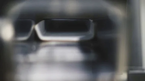 Production line for tablets. Close up shot of many pills moving along Stock Footage 119286552