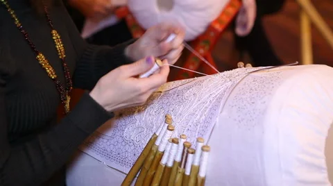 Production of linen thread lace handmade. flax factory worker creates a lacy Stock Footage 46025089