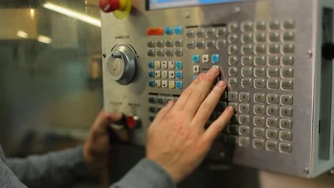 Production. the master launches the machine. scoreboard with buttons. technology Stock Footage 126397082