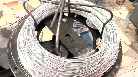 Production of metal barbed wire, close-up Stock Footage 205475111