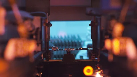 Production of a microchip with the help of an automatic machine Stock Footage 128775806