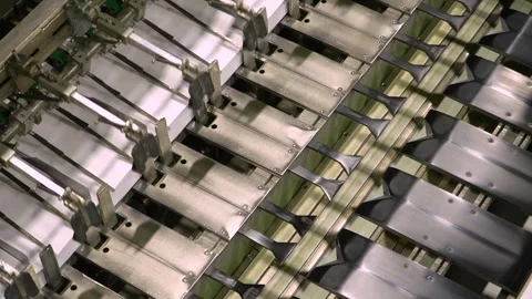 Production of office paper. The machine cuts paper into A4 sheets Video stock 314895748
